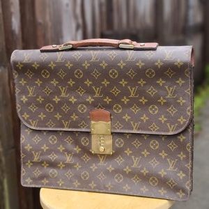 VINTAGE Louis Vuitton
Monogram Canvas Serviette Conseiller Briefcase